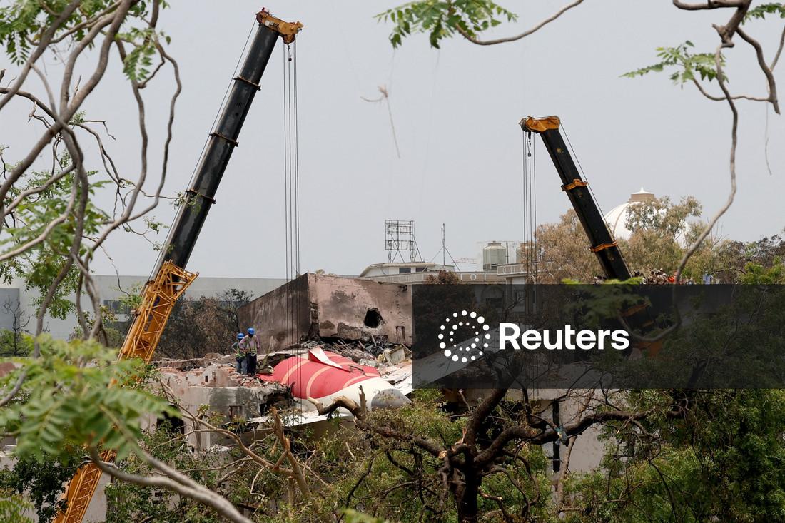U.S. officials survey Air India crash site, families continue to wait for bodies